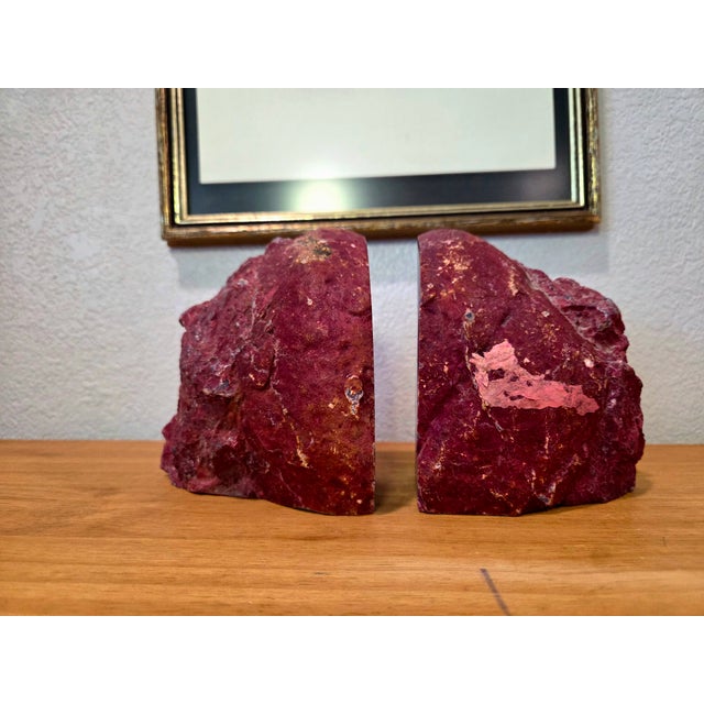 Vibrant and naturally captivating, this pair of pink agate geode bookends brings sculptural beauty and refined color to...