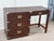 Who doesn’t love a campaign desk?! Sleek lines, great original brass hardware, and just the right size. 3 side drawers and...