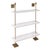 Modern multi-tier shelf in aged brass and white shelves, details urban simplicity with burnished finishes. Marais Shelf...