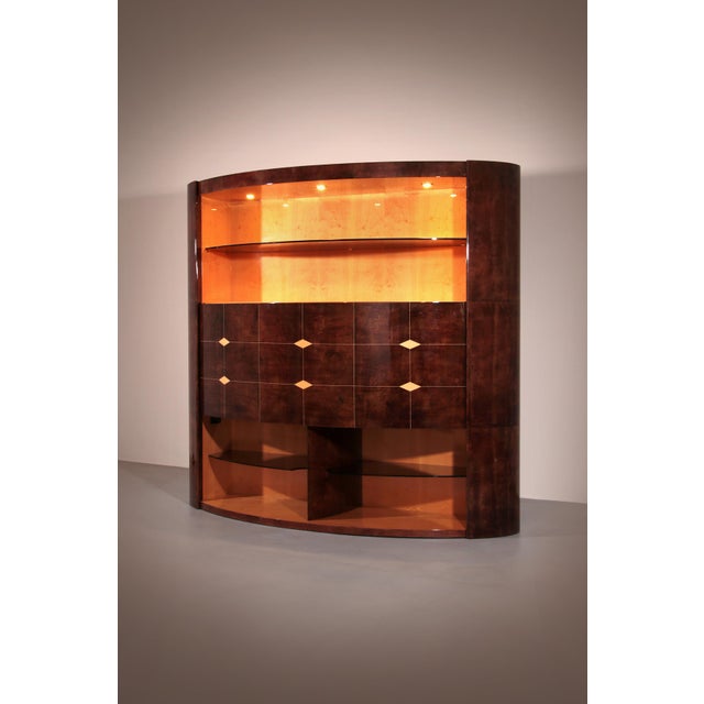 Step into the world of refined Italian design with this extraordinary Aldo Tura goatskin bar cabinet, crafted in Italy...