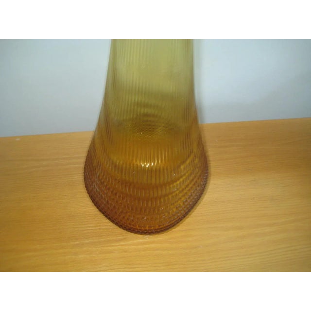 Amazing Midcentury LE Smith 40 inch tall swung floor vase in a beautiful amber color. This vase was produced in the 1960s...