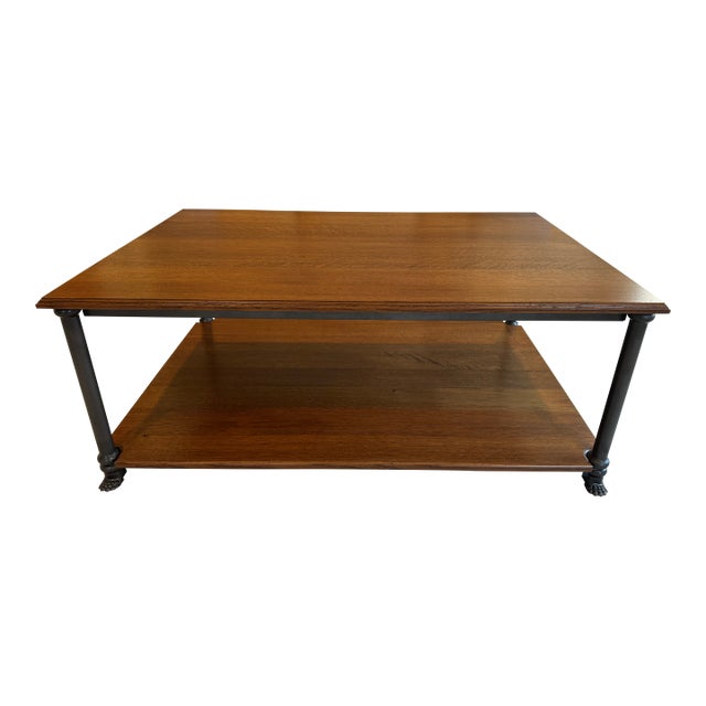 Two Tiered Oak Coffee Table With Iron Frame and Claw Foot Legs For Sale