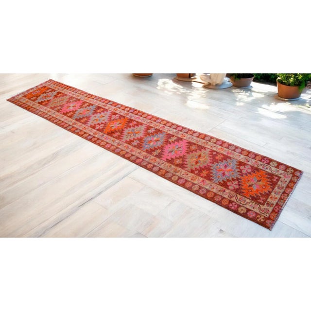 A vintage Turkish runner is an extremely rare rug from the kurdish region. This texture, color combination and long size...