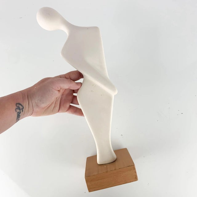 Incredible vintage abstract bisque/ceramic figural statute. Giving me 80s Art Deco vibes. White statue, brown vase. Love...