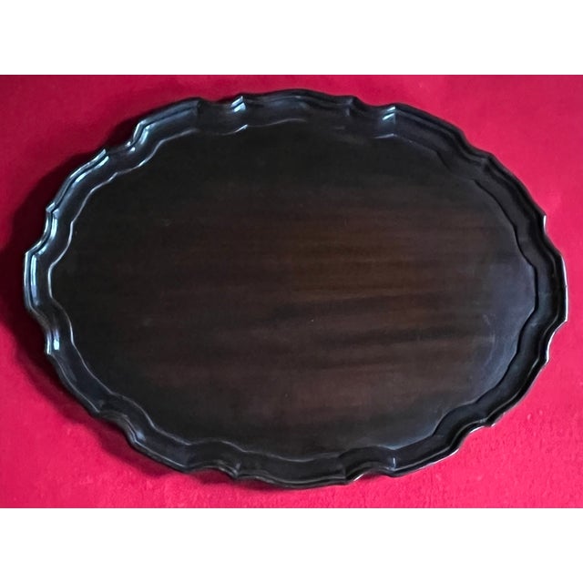 Antique early 19th century English George III mahogany oval serving tray with carved ogee rim. Measures 16" x 11 3/4" x...