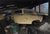 8th and Watts by Brad Davis | Oil on wood panel of a vintage car in a garage setting For Sale