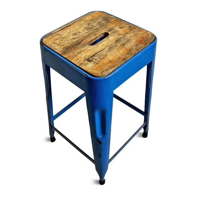 Vintage industrial style stool with blue iron legs and solid wood seat with handle. Good counter height stool. Easy to...