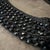 This rare 1930s Italian multi-strand necklace is a masterwork of Art Deco craftsmanship, featuring a dense weave of jet-...