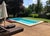 Restoration Hardware, lovely pair of chase lounges. This classic pair of all weather wicker lounge chairs from Restoration...