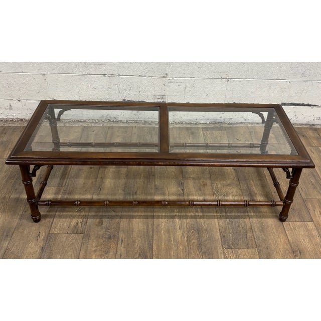 This is a gorgeous vintage 1970s Lane walnut Chinese Chippendale Chinoiserie style glass top coffee table or cocktail...