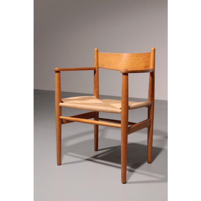 The dining chair by Hans J. Wegner is made with great attention to detail in a simple and functional design. This design...
