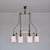Italian ceiling light dating from the 1950s, characterized by an architectural mid-century composition in brass, black...