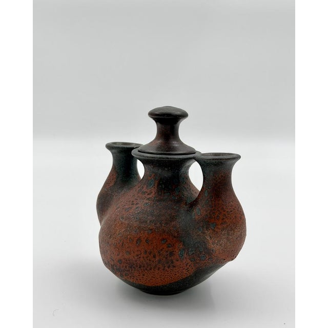 This extraordinary studio pottery piece is a handcrafted ceramic oil lamp (also usable as a sculptural vase) from the...