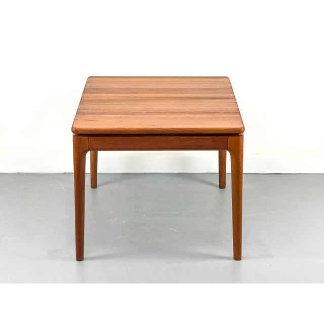 Rectangular, high-quality solid wood dining table with two central extensions that are stored under the tabletop. In...