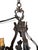 This antique French chandelier features six ornate wrought iron arms with floral details. It showcases candelabra-style...