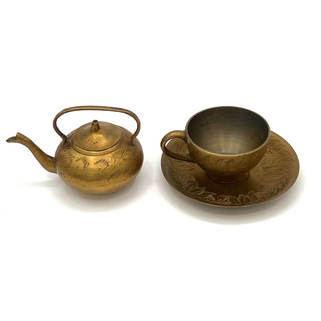 Whold set weighs 8 oz. Dimensions are of the tea pot. Solid brass decorated with incised leaf and foliate motifs.