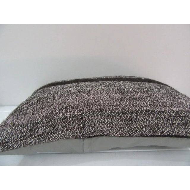 This is a pillow cover made from a vintage kilim rug. The piece was properly washed and ready to use. Pillow inserts not...