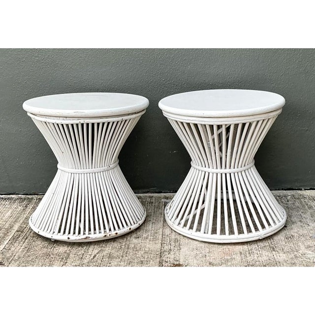 This pair of vintage stick rattan hourglass tables showcases a sculptural, sheaf-like silhouette reminiscent of...