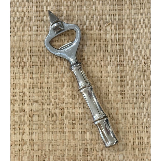 Tiffany & Co Sterling Silver bottle opener. Handle is in the form of bamboo, originally designed by Van Day Truex. In the...