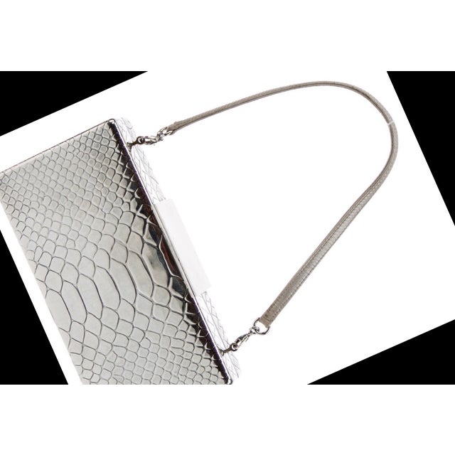 Judith Leiber 925 Sterling Silver Minaudiere Last Photo: similar clutch On the red carpet A Judith Leiber clutch is...