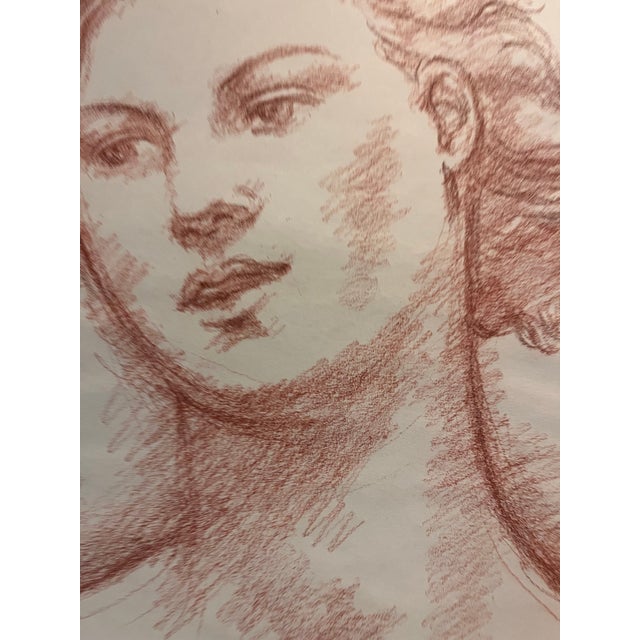 A confident, lyrical portrait drawn in sanguine (red chalk) on cream paper. A young woman tilts her head toward the viewer...