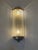 A striking set of four Art Deco wall sconces featuring cylindrical curtains of finely strung crystal beads framed by warm...
