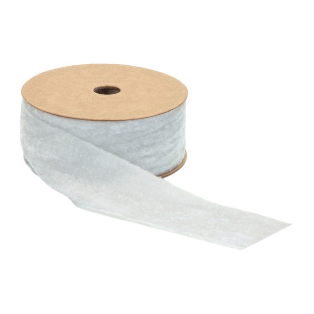 Add a touch of elegance and shimmer to your projects with this Raw Edge Velvet Ribbon in a cool silver and white tone....