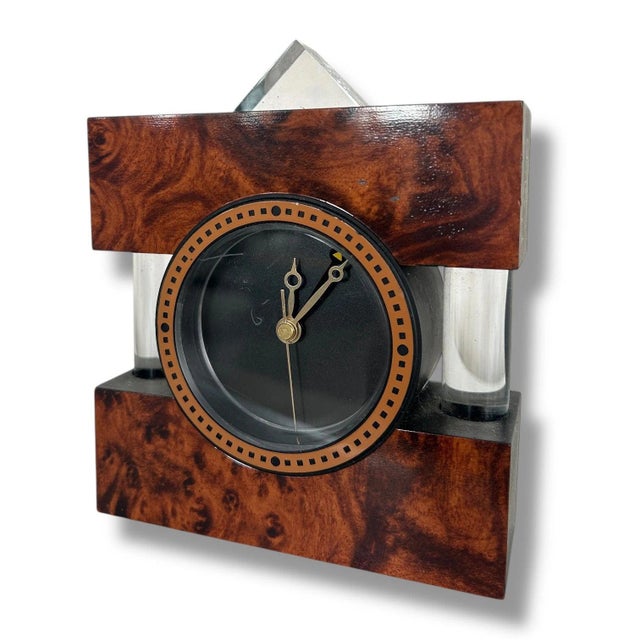 This vintage table clock by TT Design captures the essence of 1990s Italian postmodern design, offering a unique blend of...