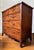Fine English mahogany George III bachelors chest features graduated drawers, French bracket feet, inlaid bottom edge and...