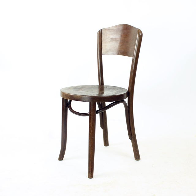Beautiful vintage chair designed by Tatra. Bentwood details and construction makes this piece a timeless item. Plywood...