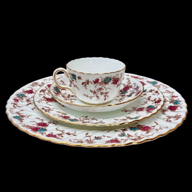 The Minton Ancestral (S-376) collection represents a distinguished example of English fine bone china from one of Stoke-...