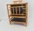 Vintage Bamboo & Ebonzied Raffia Magazine Rack For Sale - Image 4 of 6