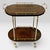 An exceptional Italian Mid-Century Modern bar cart / serving trolley from the 1960s. This luxurious piece of Italian...