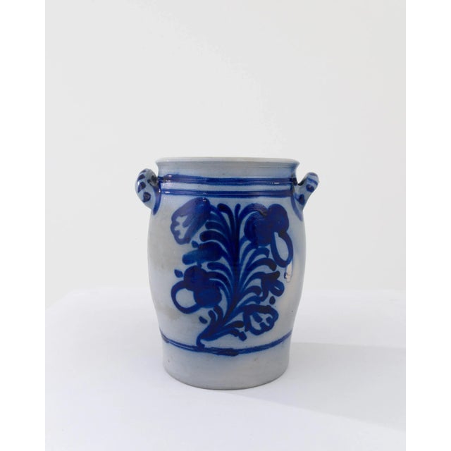 These three typical country pots are finished with a distinctive vivid blue salt glaze, enhancing the rounded clay base...