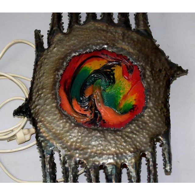 - design: unknown - made of cast glass and wrought iron sheet - strong multicoloured glass in the middle of lamp - good...