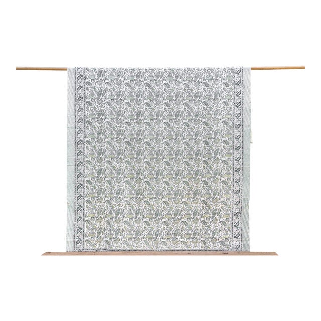 Drift into dreams with the serene beauty of our light Indian coverlet, a charming centerpiece for your bedroom decor. This...