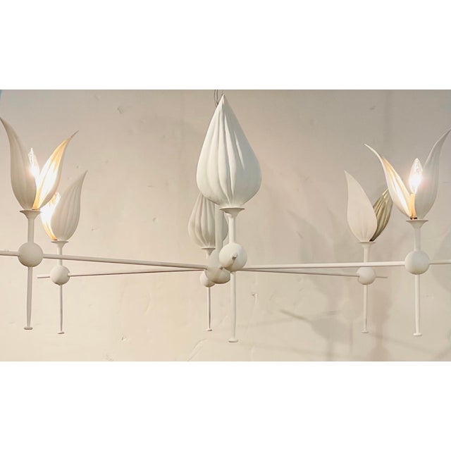 Original retail $2140, stylish Currey & Company Modern White Metal Peace Lily Chandelier, silver accents, showroom floor...