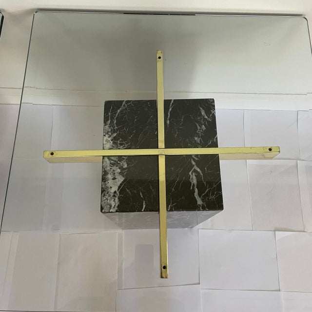 A pair of vintage 1970’s Artedi marble side tables. The tables feature a solid marble base of black Marquina marble with...