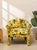 A fantastic vintage postmodern lounge chair with a sculptural barrel silhouette and bold yellow jungle-print upholstery....