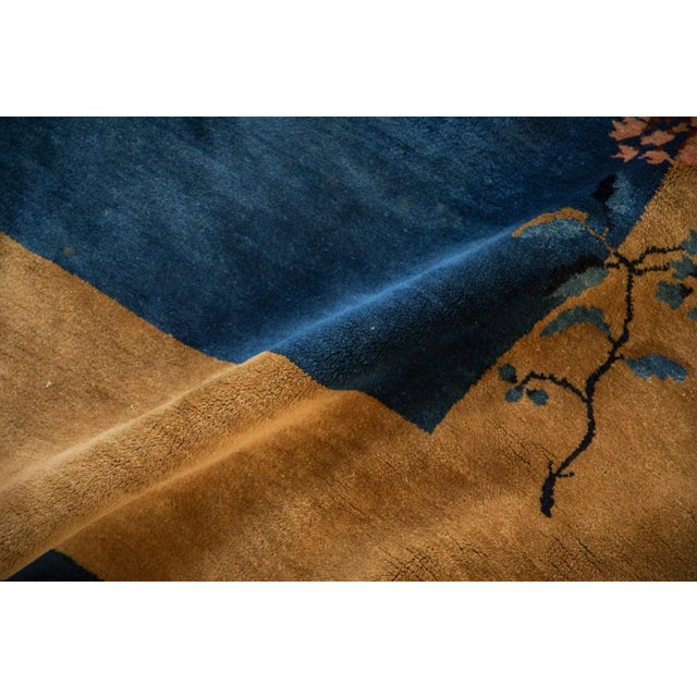 :: Open center field with pictorial view of a scrolled tree with single lantern hanging therefrom. Bats surrounding the...