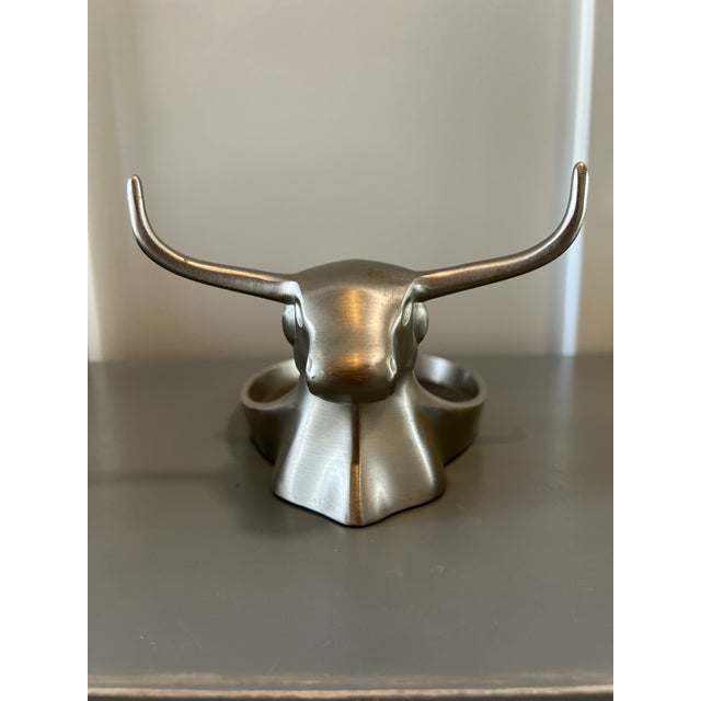 We’re bullish on style. Inspired by a vintage 1950s valet, our catchall can corral his wallet and cell phone in its faux...