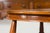 An unusual English cricket table from the mid-19th century, with circular sycamore top and cross-stretcher. Born in...