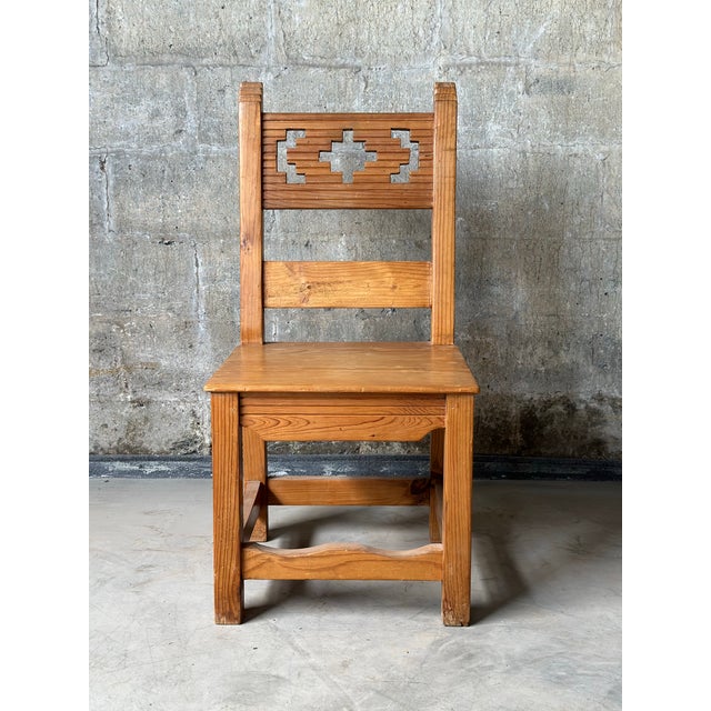 Six Spanish dining chairs made of solid pine. Gorgeous carvings on the chair posts and seat back splat. Clean lines and...