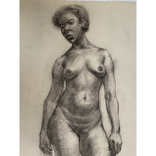 Nicely rendered nude portrait of a beautiful Black woman. Her pose suggests strength and thoughtfulness. Found with two...