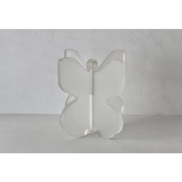 Lion in Frost Style Butterfly Wing Lucite Acrylic Coffee Table Base, frosted. The piece comprises of two Lucite pieces...