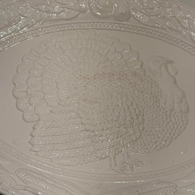 This substantial vintage white majolica turkey platter was crafted in Portugal by A. Santos (Model 8102). A high-relief,...