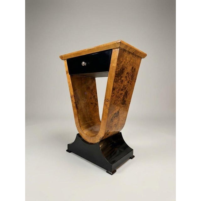 Elevate your bedroom decor with this striking pair of Art Deco style bedside lockers, beautifully crafted from rich walnut...