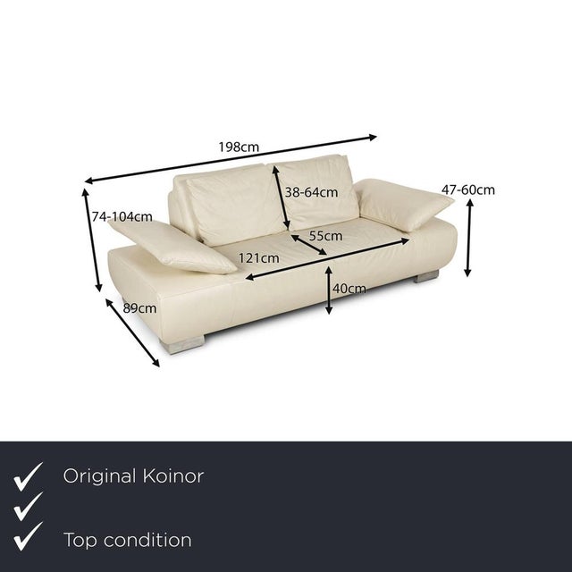 The Volare sofa from Koinor is covered in cream-colored genuine leather and stands on narrow, silver metal feet. The sofa...