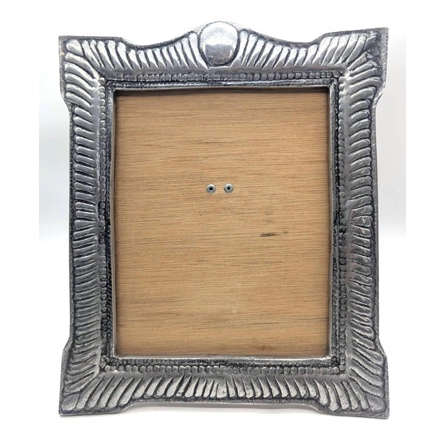 Offered is a vintage 1980s Mexican pewter and wood 8" x 10" photo frame. It does not have a glass shield and requires a...