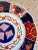 Lovely vintage Imari plate with traditional hues of burnt orange, blue and gold. Underside decoration. 9" diameter....